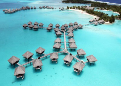 Bora Bora Hotel rooms over sea water.